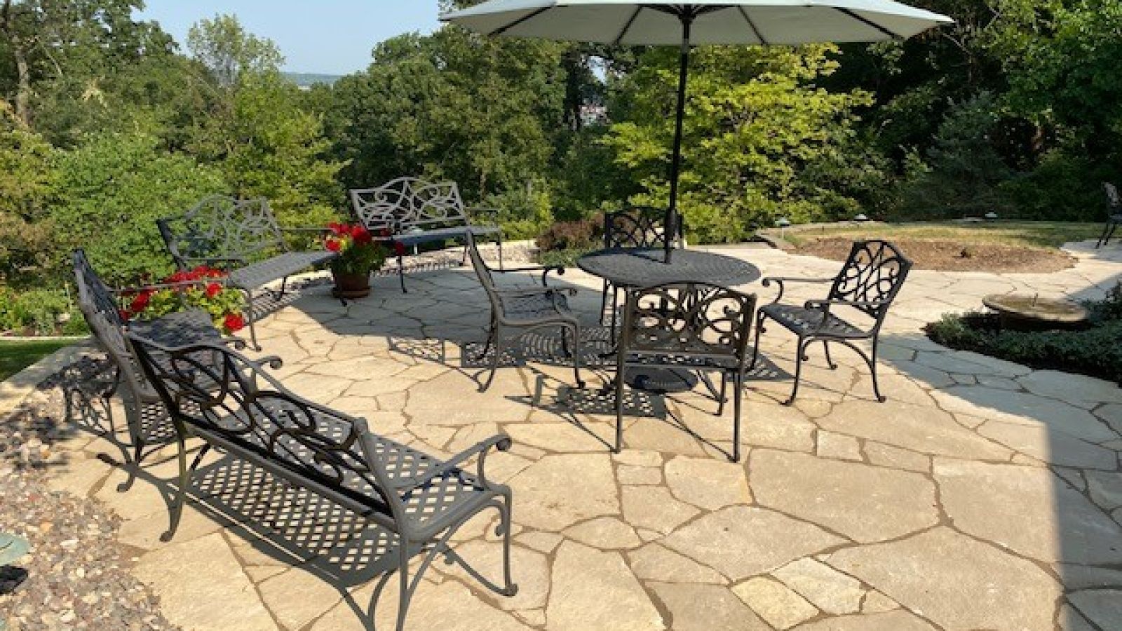 Stone patio with patio furniture 