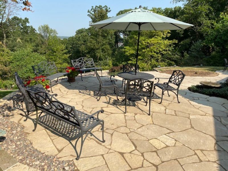 Stone patio with patio furniture 